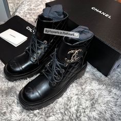 Chanel Combat Boots Quilted Lace Up Interlocking Cc Logo Condition: New In Box With Dust Bag Size: Women’s Us 7/ Eu 37 Color: Black With Gold Tone Hardware Material: Calfskin & Metal Authentic, Please Feel Free To Look At All My Reviews Given By Other Buyers. Rest Assured That If You Purchase This, Poshmark Authenticates Anything Over $500. It Will Get Sent Out To Poshmark Headquarters To Get Authenticated, And Once They Authenticate It, The Authenticators Will Ship It Out Directly To You. Pleas Designer Ankle Boots Medium Fit, Designer Medium Fit Ankle Boots, Designer High-top Boots With Reinforced Heel, Luxury Lace-up Patent Leather Boots, Designer Boots With Reinforced Heel And Medium Fit, Luxury Patent Leather Boots, Luxury Round Toe Boots With Branded Insole, Luxury Boots With Round Toe, Designer Black Boots With Medium Fit