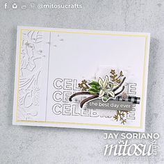 a close up of a greeting card with flowers on the front and bottom, in white