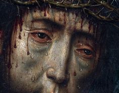 the face of jesus with blood dripping down from his forehead and crown on top of him