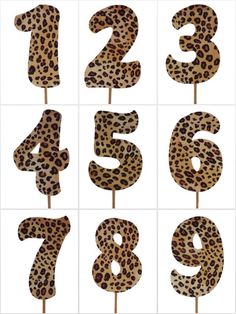 the numbers are made out of fake leopard print material, and it looks like they could be used as cake toppers