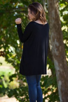 One of the softest tops we've ever felt and a fit that looks great on anyone. You are sure to love these Piko tops. The extra length on this one makes it great to pair with your favorite leggings. The Perfect Piko Tunic is the original piko style that everyone loves. The bamboo blend is soft and easy to care for. The sleeves are fitted and the body is over-sized. The piko tunic is the same style as our "The perfect piko top" But has a few extra inches to add some length. For the shorter girls, t Versatile Black Loungewear Tops, Black Crew Neck Versatile Top, Oversized Black Soft Knit Top, Black Long Sleeve Top For Everyday Fall Wear, Winter Black Tops For Everyday, Plain Tops For Layering In Fall, Black Everyday Winter Top, Black Winter Tops For Everyday Wear, Casual Black Long Sleeve Top For Fall