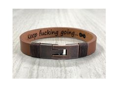 Sturdy genuine leather bracelet can be personalized with a message on the front side or a hidden message for a more personal meaning. It has a nice wrap cord touch on the edges for a more casual look. All my bracelets are made with HIGH QUALITY material. ENGRAVING SUGGESTIONS Messages/Names/Dates/Coordinates/Bible verses/Roman numeral... For any special requests, other languages, symbols, logos, or questions regarding the item, contact me before purchasing. -All items are shipped in a nice jewel Brown Leather Bracelet With Engraving Option, Rectangular Leather Bracelet As A Gift, Rectangular Leather Bracelet For Gift, Rectangular Leather Bracelet Gift, Personalized Brown Leather Bracelet For Father's Day, Adjustable Leather Bracelet With Engraving Option For Father's Day, Father's Day Leather Bracelet Gift, Hand Stamped Brown Leather Bracelet Gift, Leather Strap Wristband As Gift