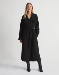 This cocooning, oversized trench coat renders the House’s signature double-face construction in a naturally warm and breathable virgin wool Italian fabric with hand-finished picking. The A-line shape is masterfully unstructured with exaggerated notch lapels and raglan sleeves, while cascading ties cinch the waist before falling to a sweeping calf hemline.Shop all Coats Face Construction, Oversized Trench, Oversized Trench Coat, Denim Suit, Belted Trench Coat, Skirt And Blouse, Italian Fabric, Double Face, Blazer Coat