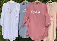 three shirts hanging on a clothes line with the words, bath and sleep written in white