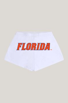 Basic booty shorts with elastic waistband and side pockets. Printed logo on the back. About the Style: 95% Cotton, 5% Spandex Sits on the hip. Option to fold waistband Screen Print logo Soffee Shorts, Soffe Shorts, Logo Application, University Of Florida, Print Logo, Screen Print, See You, Screen Printing, University