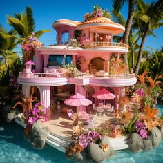 a pink house with lots of flowers and umbrellas on the roof is in the water