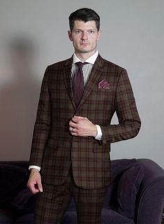 When it comes to checks, the possibilities are endless. Choose our Scabal Brown Check Wool Jacket for a more understated presence that exudes class and confidence rather than being overly loud. Custom-made from superfine merino wool, a natural fiber that offers both style and comfort in equal measure. The captivating plaid pattern, created by pink yarns on a brown background, enhances its overall look. Perfect for both official and unofficial rendezvous. 
  Look Includes    Scabal Brown Checks W Fitted Long Sleeve Tweed Jacket For Business, Tailored Plaid Outerwear For Business, Formal Plaid Tweed Jacket With Long Sleeves, Plaid Suit For Business Casual In Fall, Plaid Business Casual Fall Suit, Tailored Plaid Outerwear With Lapel Collar, Fitted Plaid Outerwear With Welt Pockets, Plaid Suits With Suit Collar For Fall, Tailored Plaid Sport Coat With Long Sleeves