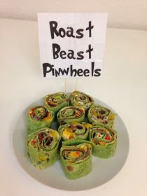 there is a plate with rolls on it and a sign that says roast peal pinwheels