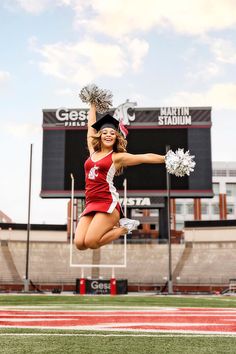 a cheerleader is jumping in the air