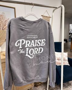 Screen Printed Let Everything That Has Breath Praise The Lord Sweatshirt Color: Stonewash Green, Sand, Indigo, Rock, Dusty Pink, Brown, Black Fit: Unisex, Fits relaxed (see size guide in photos for reference) Sizing: S,M,L,XL,2XL Material: 50/50 cotton/polyester blend Printed Placements: Center Front & Back Ink Color: White *this listing cannot be customized* PROCESSING/TURNAROUND TIME: -Processing/Turn around times may vary. Please check the estimated ship/delivery times.  -Processing/Turn around time DOES NOT include shipping time. *PLEASE NOTE color resolutions in the photos may differ depending on devices. *This is a HONEY SOUL SHOP original design, do not copy* Crew Neck Tops With Lettering For Loungewear, Long Sleeve Top With Lettering For Loungewear, Long Sleeve Loungewear Top With Lettering, Christian Sweatshirt, Cozy Sweatshirts, Christian Clothing, Original Design, Black Fits, Dusty Pink