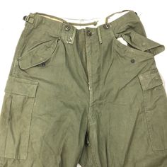 Vintage Flight Pants 1950-60s size: medium waist- 32” crotch- 18” height- 46” Vintage Wide Leg Cargo Pants With Side Pockets, Vintage Cargo Pants With Tapered Leg And Hip Pockets, Vintage Tapered Leg Cargo Pants With Side Pockets, Vintage Cargo Pants With Tapered Leg And Side Pockets, Vintage Full-length Cargo Pants With Side Pockets, Fitted Vintage Cargo Pants, Vintage Cotton Cargo Pants With Belt Loops, Vintage Cargo Pants With Side Pockets, Fitted Vintage Cargo Pants With Pockets