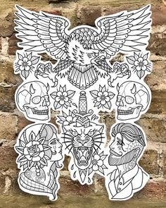 sticker with skulls and flowers in the shape of an eagle on a brick wall