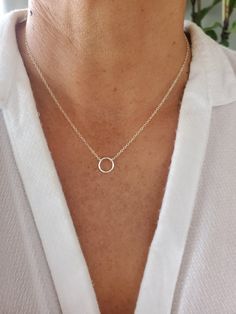 "This fun and versatile set adds a touch of sparkle to any outfit. You can wear them together or separately. The necklaces are completely separate and made in lengths 2 inches apart to stagger them appropriately. Shown in photos in 16\", 18\", 20\" set. Necklaces are all handmade with high quality gold fill or sterling silver materials so they won't tarnish or discolor. You can wear them in the shower, to the beach, gym etc. 3 piece set includes: 1) Tiny Open Circle Necklace 2) Tiny Pave Crystal Delicate Chain Open Circle Necklace, Elegant Circle Charm Necklaces For Everyday, Elegant Everyday Circular Charm Necklaces, Elegant Open Circle Charm Necklace, Minimalist Circle Charm Necklace, Necklaces Layering, Open Circle Necklace, Beach Gym, Three Necklaces