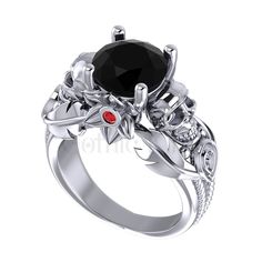 GOTHICKING OFFERS YOU VERY UNIQUE & ANTIQUE GOTHIC SKULL JEWELLERY WITH MULTI-COLOR METAL, LIKE YELLOW, ROSE, AND WHITE GOLD FINISH.                                                    WE OFFER CUSTOM JEWELLERY LIKE, METAL CHANGE, ENGRAVING AND GIFT CARD ETC. PRODUCT DESCRIPTION: Metal : Sterling Silver Metal Purity : 925 Metal Finish: White Gold Finish/Yellow Gold Finish/Rose Gold Finish Main Stone Color :  Black & Red Main Stone Shape : Round Total Carat Weight : 2.20 Ct Main Stone : Lab Sapphi Black Skull Rings As Gift, Black Skull Rings For Gift, Black Skull Ring For Anniversary, Black Skull Jewelry For Anniversary, Symbolic Black Skull Ring, Red Sapphire, Custom Jewellery, Vintage Floral Design, Gothic Skull