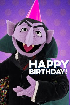 the puppet is wearing a birthday hat