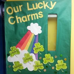 a door decorated with shamrocks and the words our lucky charms