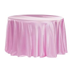 a round table covered in pink satin