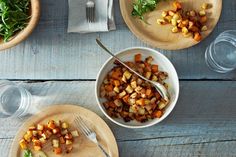 there are two bowls with food on the table next to each other and one has a fork in it