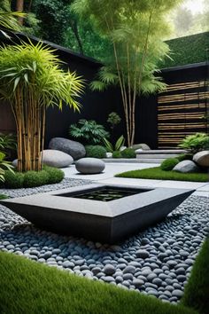 an outdoor garden with rocks and plants