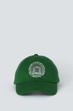 Forest Green/White Center for Intuitive Studies Circle Logo Hat from Assembly New York. Six panel hat. Vent holes. Adjustable back closure. Embroidered Center for Intuitive Studies logo on the front. One size fits most - 100% Cotton - Made in USA Logo Hat, Circle Logo, Circle Logos, Panel Hat, Forest Green, Forest, New York, ? Logo, Hats