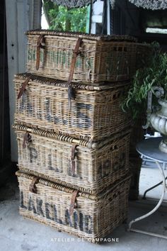 three wicker baskets stacked on top of each other