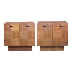 two wooden cabinets sitting side by side on top of each other