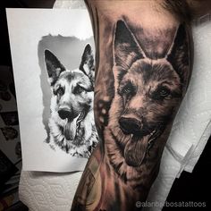 a man's arm with two dogs on it, one is black and white