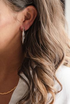 Classic + stylish -- our open hoop studs are a fun statement earring. Whether they are dressed up or down, they make the perfect accessory. Available in both gold + silver. Includes two gold or silver open hoop stud earrings Size: 40mm Thickness: 5mm All materials are lead & nickel free Metal Open Circle Hoop Earrings, Everyday Silver Hoop Wrap Earrings, Chic Small Hoop Sterling Silver Earrings, Trendy Nickel-free Wrap Earrings, Trendy Silver Wrap Earrings, Trendy Silver Wrap Earrings For Everyday, Trendy Everyday Silver Wrap Earrings, Silver Gold Earrings, Everyday Wear Jewelry