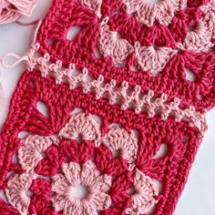 the crochet is pink and has flowers on it