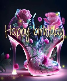 a pair of pink high heeled shoes with flowers on them and the words happy birthday