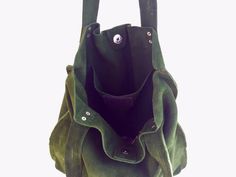 ON SALE Large green suede tote bag is a women tote bag for an every day use, this deep green suede bag is Made of soft green suede leather. Green leather handbag for women (Can be unisex, for both men and women). Soft and comfortable. This bag is one of a kind. Inside leather pocket Leather Handles Magnetic closure Unlined Very comfortable for carrying personal things, A4 files, i-pad , cosmetic bag and more. Available in 7 colors Green, black, gray, red, yellow, brown and blue. All bags are han Daily Use Suede Satchel With Suede Lining, Suede Shoulder Bag With Suede Lining For Shopping, Suede Bucket Bag With Soft Leather, Daily Use Suede Bucket Bag With Double Handle, Green Soft Leather Bucket Bag With Double Handle, Suede Bucket Bag For Shopping, Suede Double Handle Bucket Bag For Daily Use, Soft Suede Bucket Bag For Shopping, Soft Suede Leather Bucket Bag For Shopping