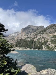 a mountain lake surrounded by trees and rocks