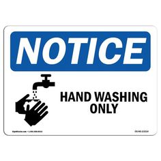 a blue and white sign that says notice hand washing only