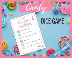 the candy dice game is on display with colorful candies and lollipops