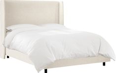 a bed with white linens and pillows on it's headboard, against a white background