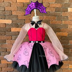 Our new Vampire Costume, specially designed for girls, is a nice choice for a Monster themed birthday party, Halloween, photo shooting and many other events. 
Monster girl dress is our own design and make. 
Halloween Monster Costume is made of highest quality mattsatin, crystal tulle, printed suede fabric, lamé fabric, dream tulle and flog printed tulle.
This Dracula Halloween Costume has a zipper on the back for an easy dressing up.