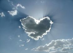 a heart shaped cloud in the sky