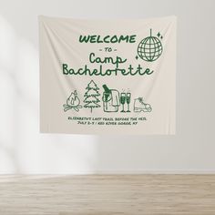 a welcome sign hanging from the side of a wall in front of a wooden floor