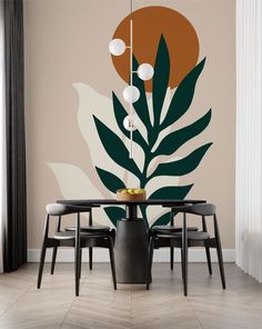 a dining room table with four chairs and a wall mural in the background that has leaves on it