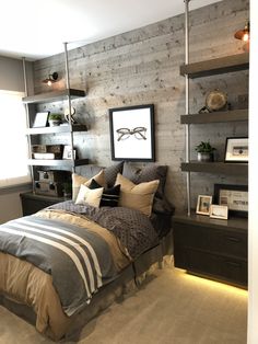 a bed sitting in a bedroom next to a shelf filled with books and other items