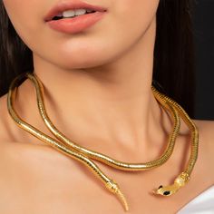 Add some sparkle to your look with this adjustable gold snake long necklace. This moldable bendable jewelry is perfect for multi-use with a stud look, bracelet, wrap collar, belt, or as an arm cuff. Shine in style with this dazzling necklace!