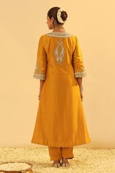 Mustard yellow A-line kurta with ivory Kashmiri tilla applique gota and kundan embroidery. Paired with a salwar. - Aza Fashions Elegant Yellow Chanderi Kurta, Yellow Raw Silk Dress For Reception, Yellow Kurta For Diwali Reception, Elegant Yellow Silk Anarkali Set, Yellow Embroidered Kurta For Reception, Elegant Yellow Anarkali Set With Gota Work, Elegant Yellow Kurta With Traditional Drape, Elegant Yellow Traditional Wear With Gota Work, Yellow Cutdana Dress For Transitional Season