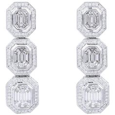 These exquisite emerald cut earrings are handcrafted in 14-karat white gold and set in 4.20 carats of sparkling diamonds. FOLLOW MEGHNA JEWELS storefront to view the latest collection & exclusive pieces. Meghna Jewels is proudly rated as a Top Seller on 1stDibs with 5 star customer reviews. All items manufactured by us are handmade and can be customized or redesigned. Certificate available upon request. Composition Total Weight :- 16.87 gm 14k White Gold Weight :- 16.03 gm Diamond Weight :- 4.20 Emerald Cut Earrings, Art Jewelry Design, Cut Earrings, Diamond Jewelry Designs, Diamond Dangle Earrings, Gold Art Deco, Estilo Art Deco, Gold Art, Emerald Cut Diamonds