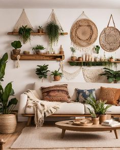 a living room filled with lots of potted plants and hanging wall art above the couch