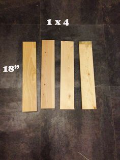 four pieces of wood sitting on top of a floor next to each other with measurements