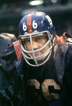 a close up of a football player wearing a helmet