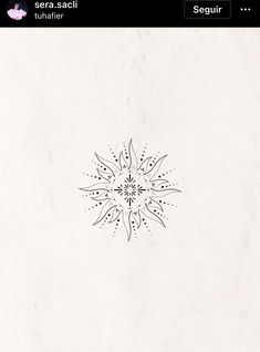 an image of a snowflake that is on the wall in front of a cell phone