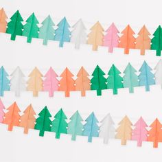 Our hanging Christmas decorations feature tissue paper Christmas trees in lots of colors for a merry and bright look. Tissue Paper Trees, Outdoor Christmas Gifts, Mini Garland, Christmas Party Table, Halloween Garland, Paper Christmas Tree, Christmas Tree Garland