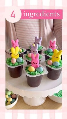 there are four small cupcakes decorated like bunnies