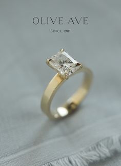 an engagement ring with a princess cut diamond